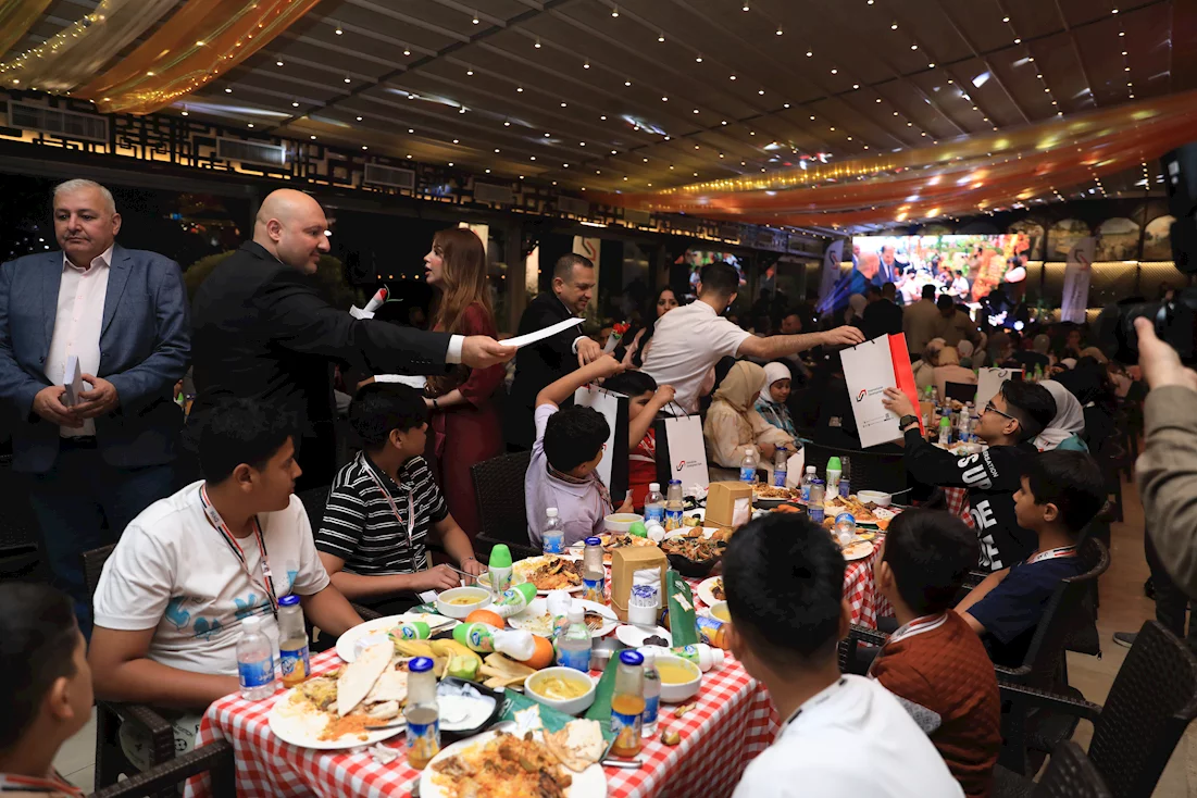 Iftar dinner by the International Development Bank and a group of orphanage children